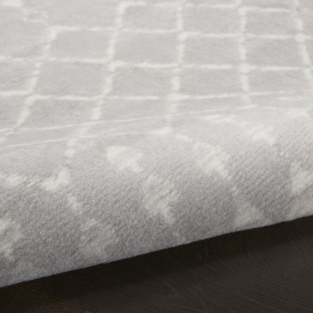 5' X 7' Ivory And Blue Geometric Area Rug