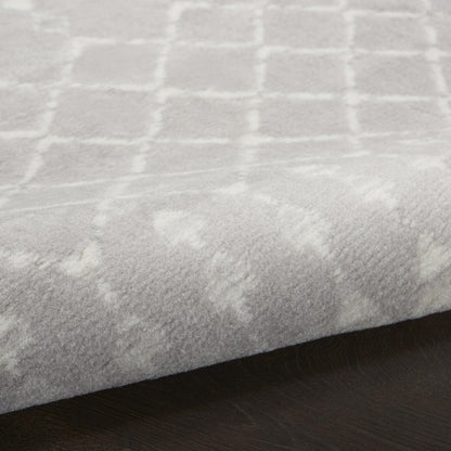 6' X 9' Ivory And Blue Geometric Area Rug