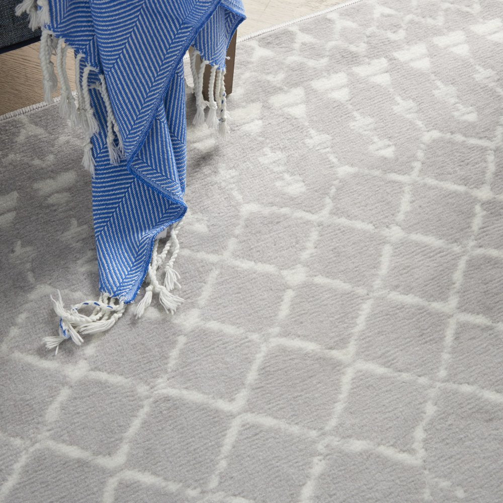 5' X 7' Ivory And Blue Geometric Area Rug