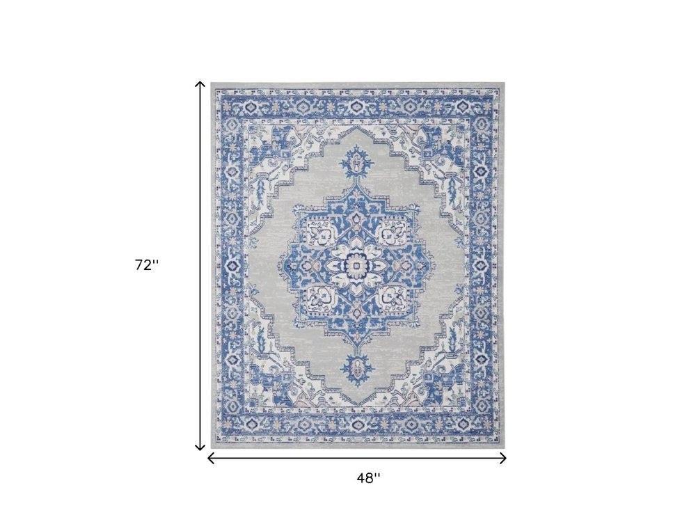 5' X 7' Ivory And Blue Medallion Area Rug