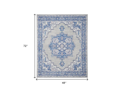 5' X 7' Ivory And Blue Medallion Area Rug