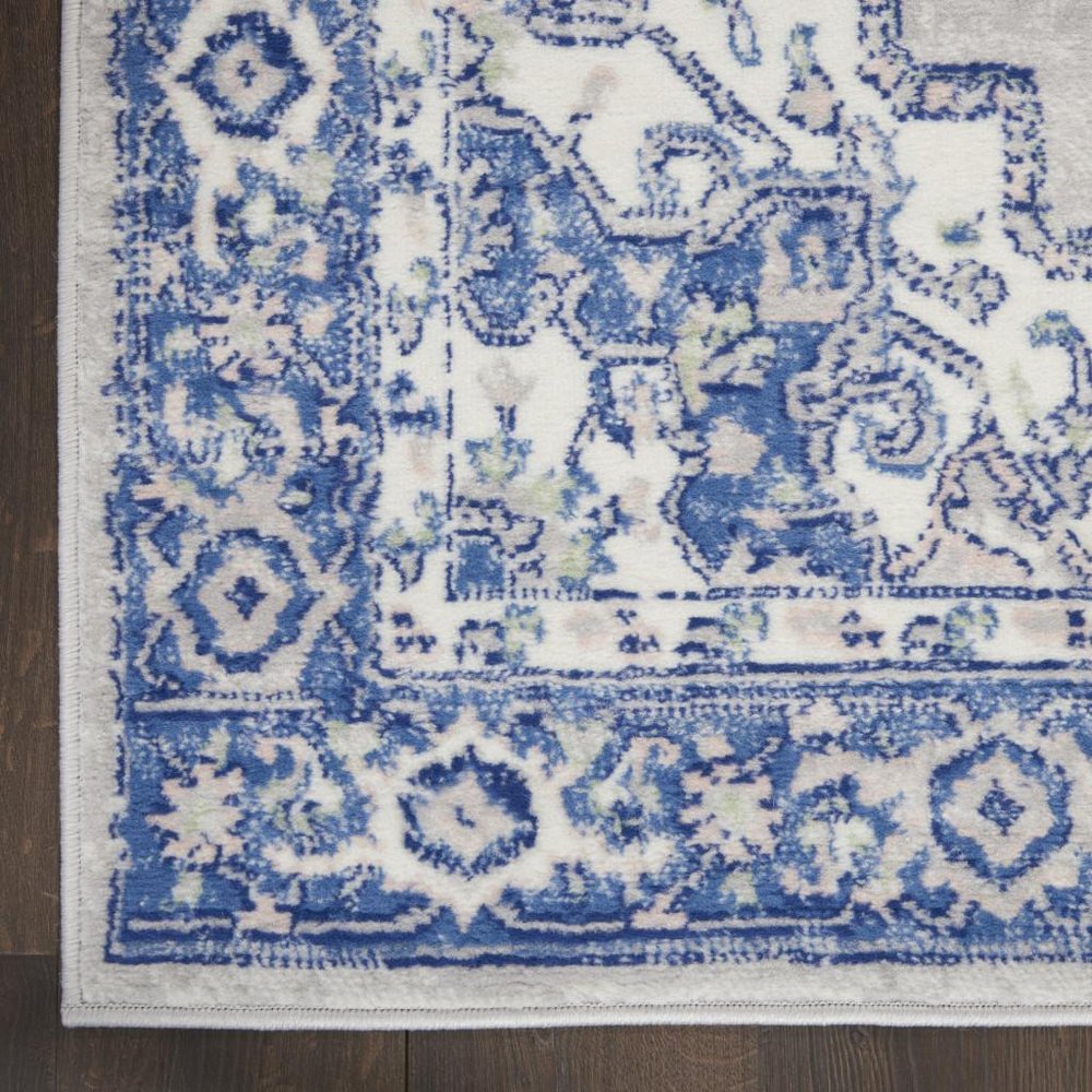 5' X 7' Ivory And Blue Medallion Area Rug