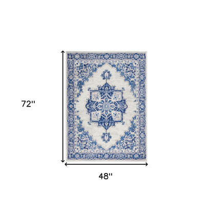 5' X 7' Navy Blue Floral Dhurrie Area Rug