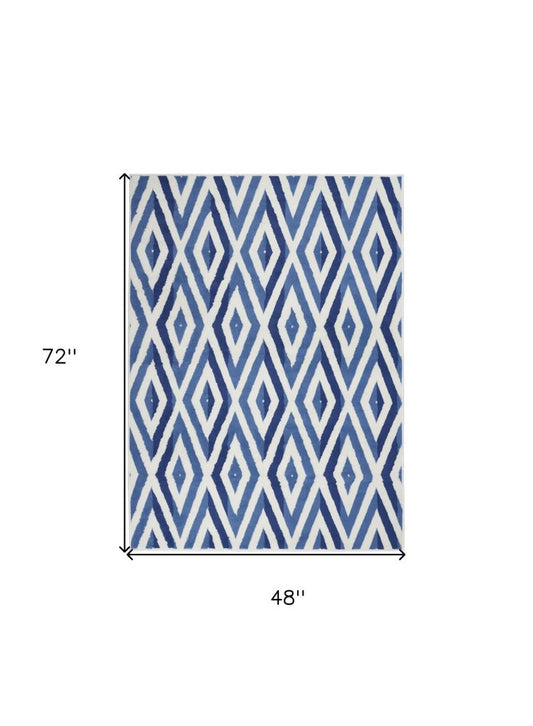 5' X 7' Ivory And Blue Geometric Area Rug