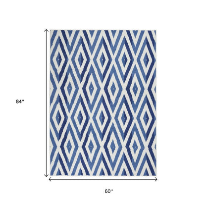 5' X 7' Ivory And Blue Geometric Area Rug