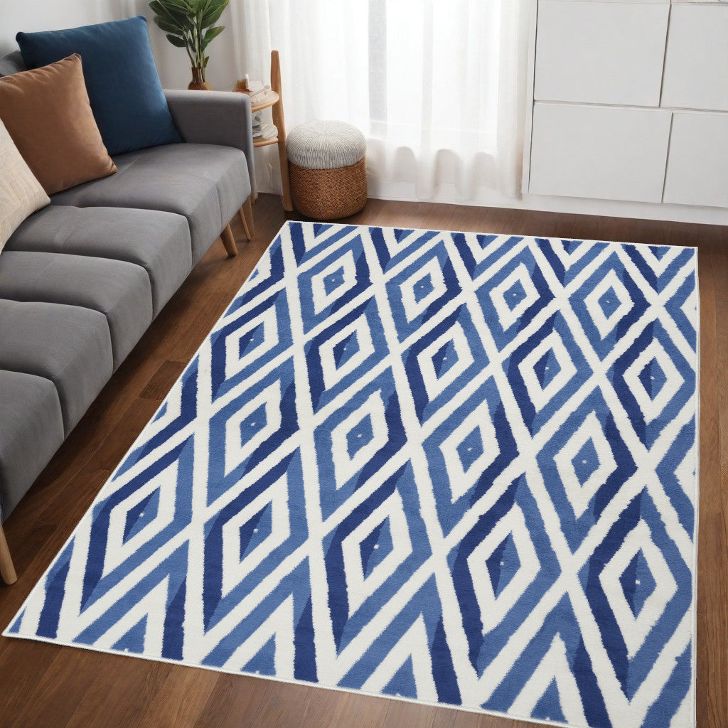 5' X 7' Blue And Ivory Geometric Dhurrie Area Rug