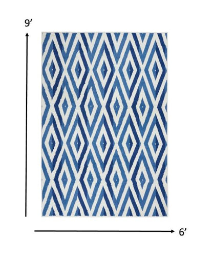 5' X 7' Blue And Ivory Geometric Dhurrie Area Rug