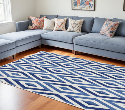 5' X 7' Blue And Ivory Geometric Dhurrie Area Rug