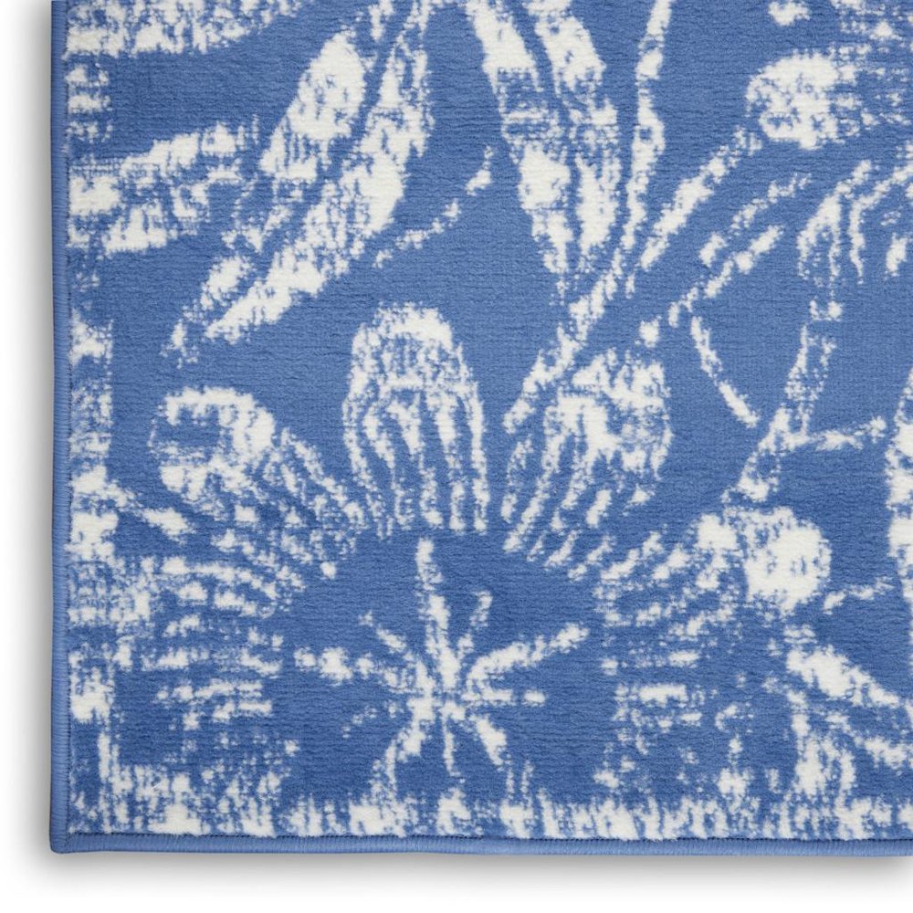 5' X 7' Blue And Ivory Floral Vines Distressed Area Rug