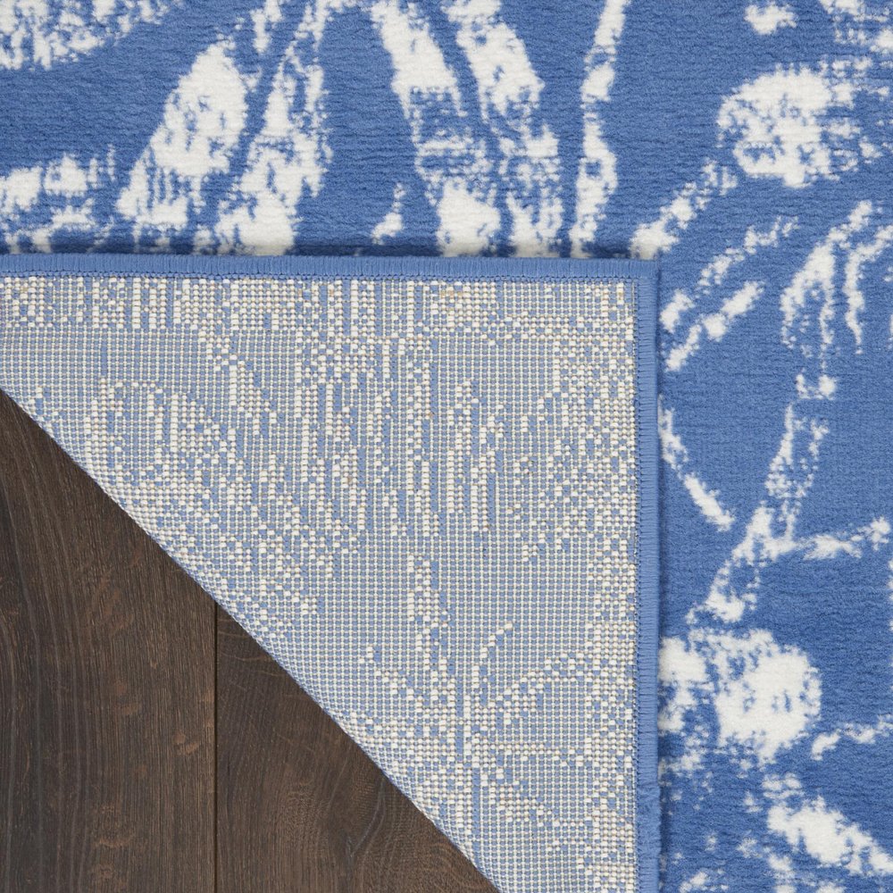5' X 7' Blue And Ivory Floral Vines Distressed Area Rug