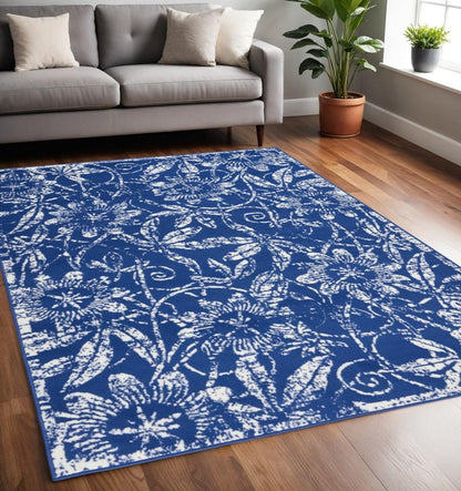 6' X 9' Ivory And Blue Floral Vines Distressed Area Rug