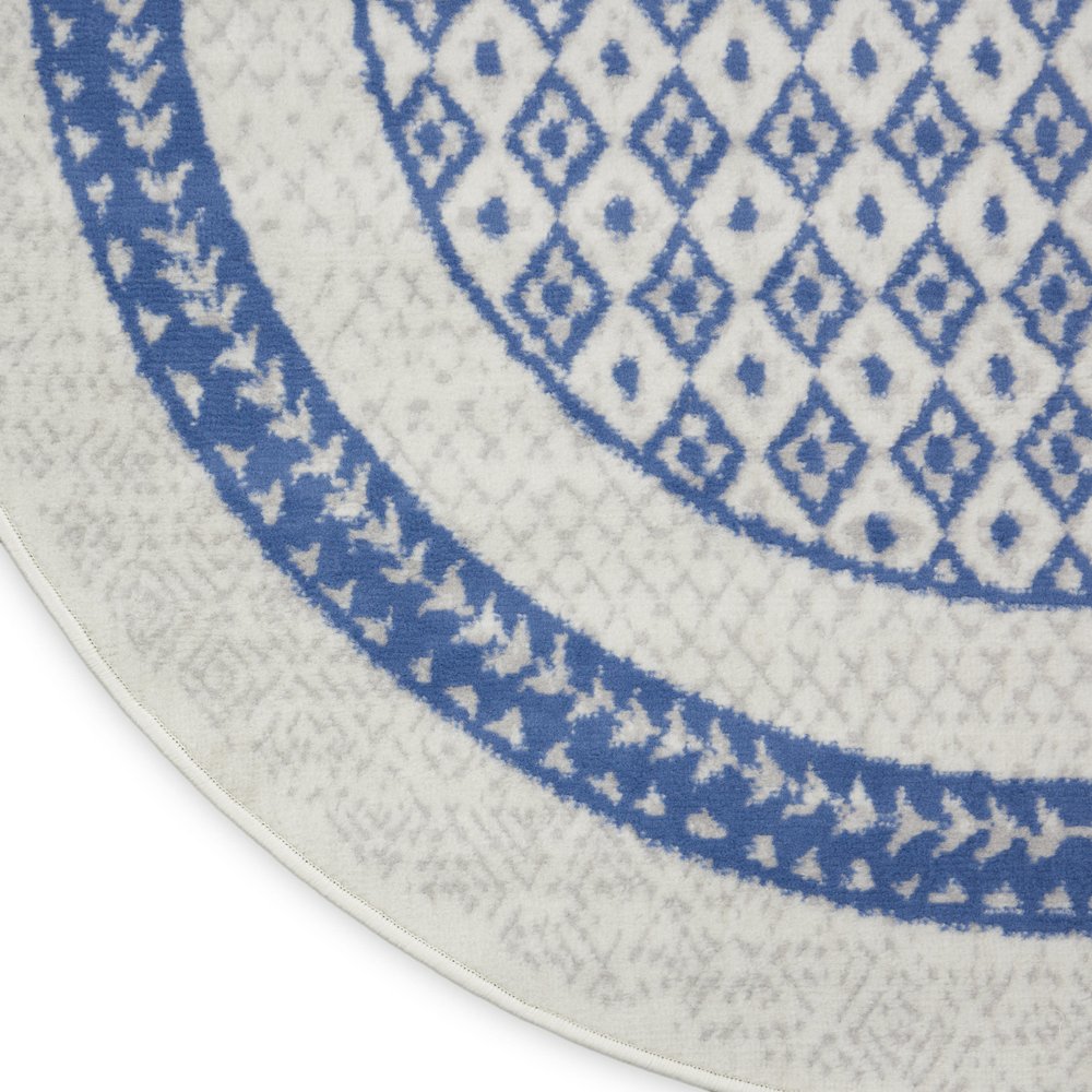 5' X 7' Ivory And Blue Ombre Distressed Area Rug