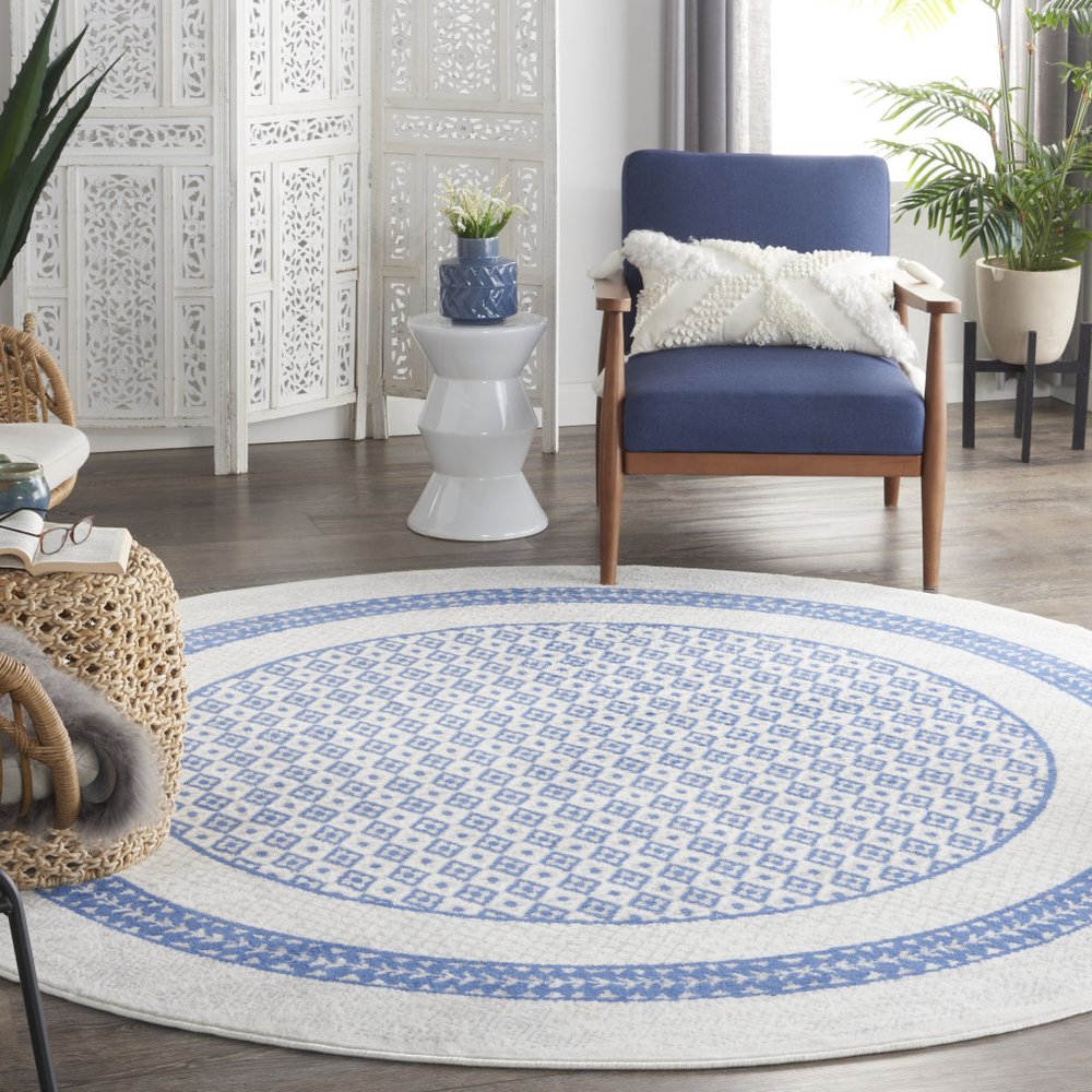 5' X 7' Ivory And Blue Ombre Distressed Area Rug