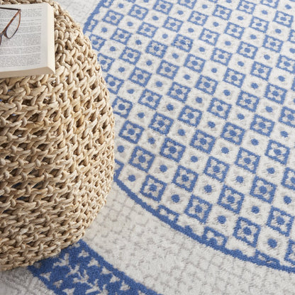 5' X 7' Ivory And Blue Ombre Distressed Area Rug
