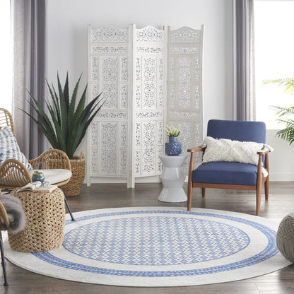 5' X 7' Ivory And Blue Ombre Distressed Area Rug