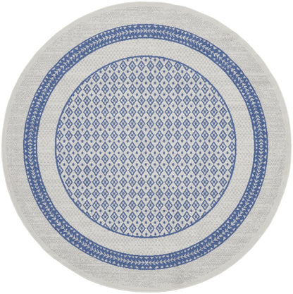 5' X 7' Ivory And Blue Ombre Distressed Area Rug