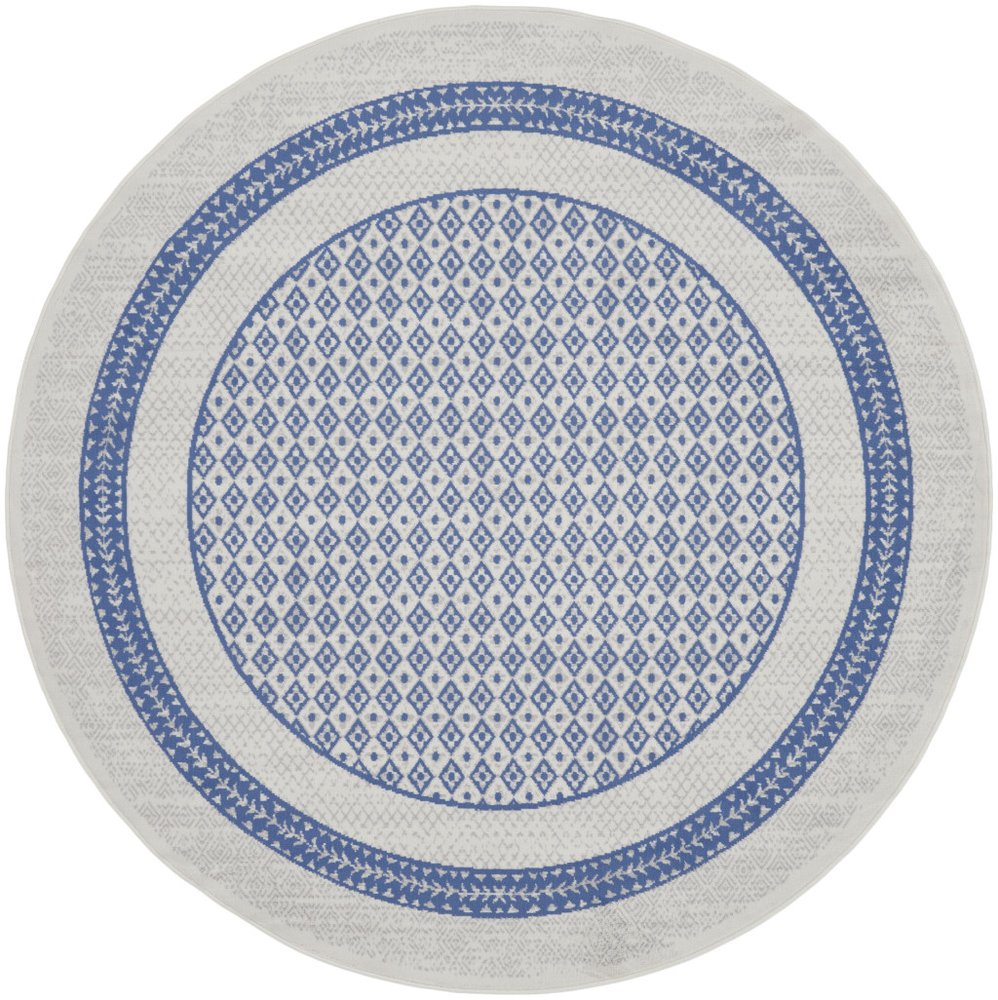 5' X 7' Ivory And Blue Ombre Distressed Area Rug