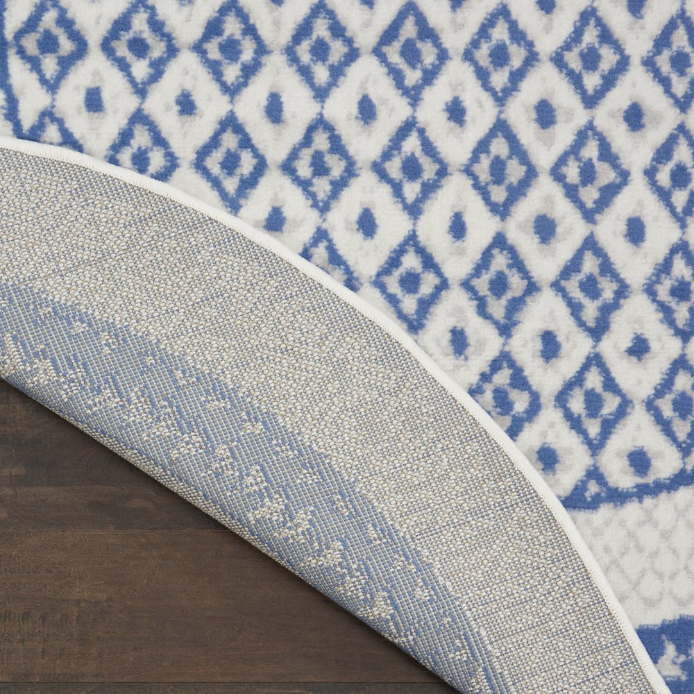 5' X 7' Ivory And Blue Ombre Distressed Area Rug