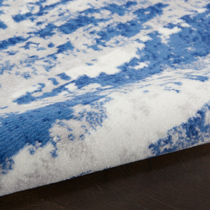 5' X 7' Blue And Ivory Ombre Dhurrie Area Rug