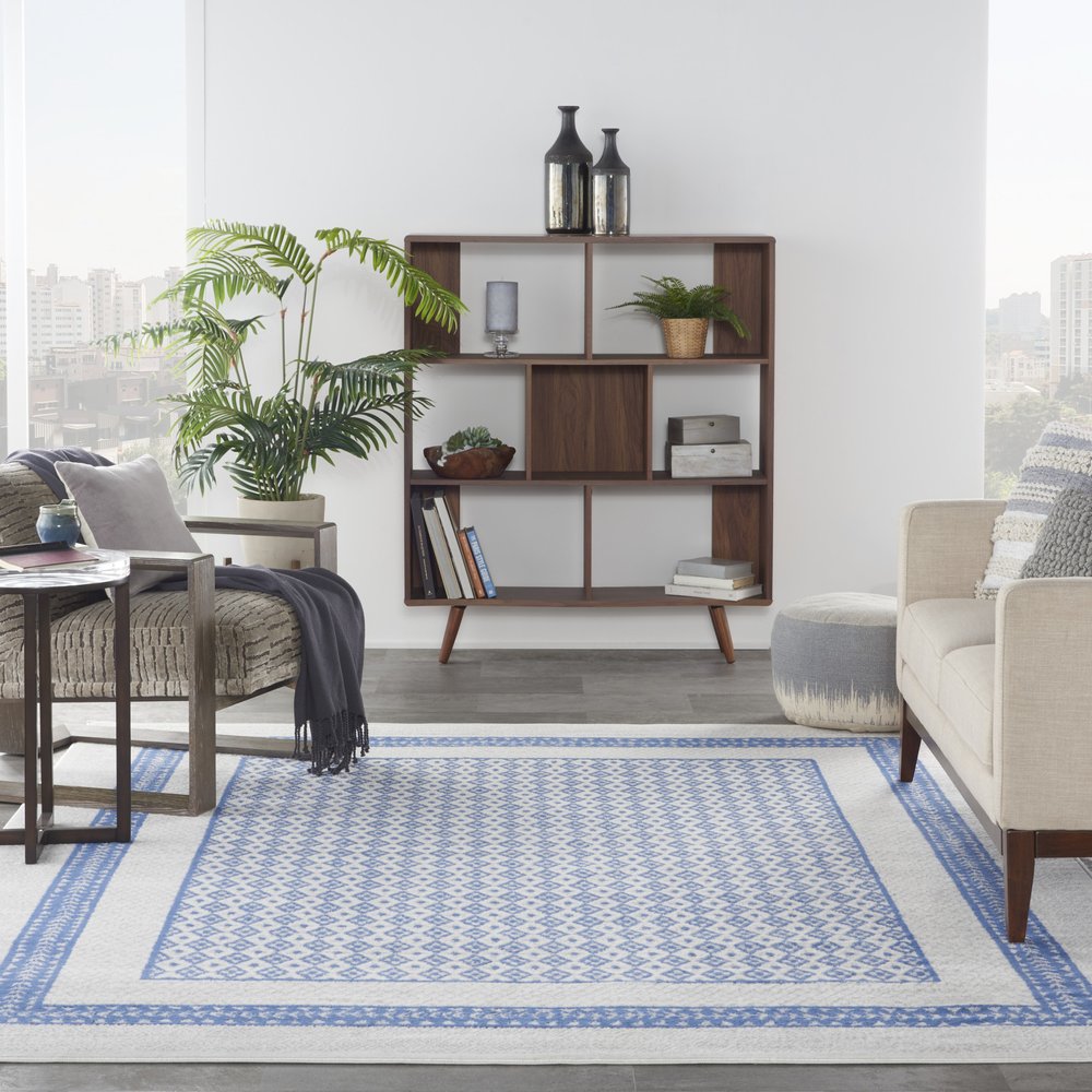 5' X 7' Ivory And Blue Ombre Distressed Area Rug
