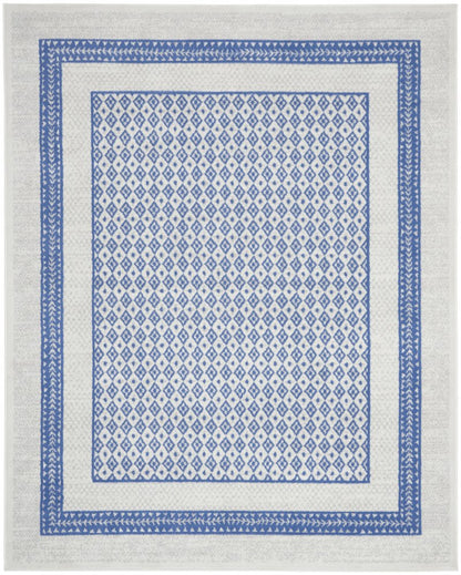 5' X 7' Ivory And Blue Ombre Distressed Area Rug