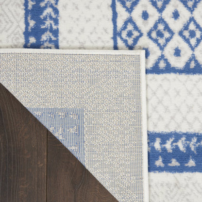 5' X 7' Ivory And Blue Ombre Distressed Area Rug