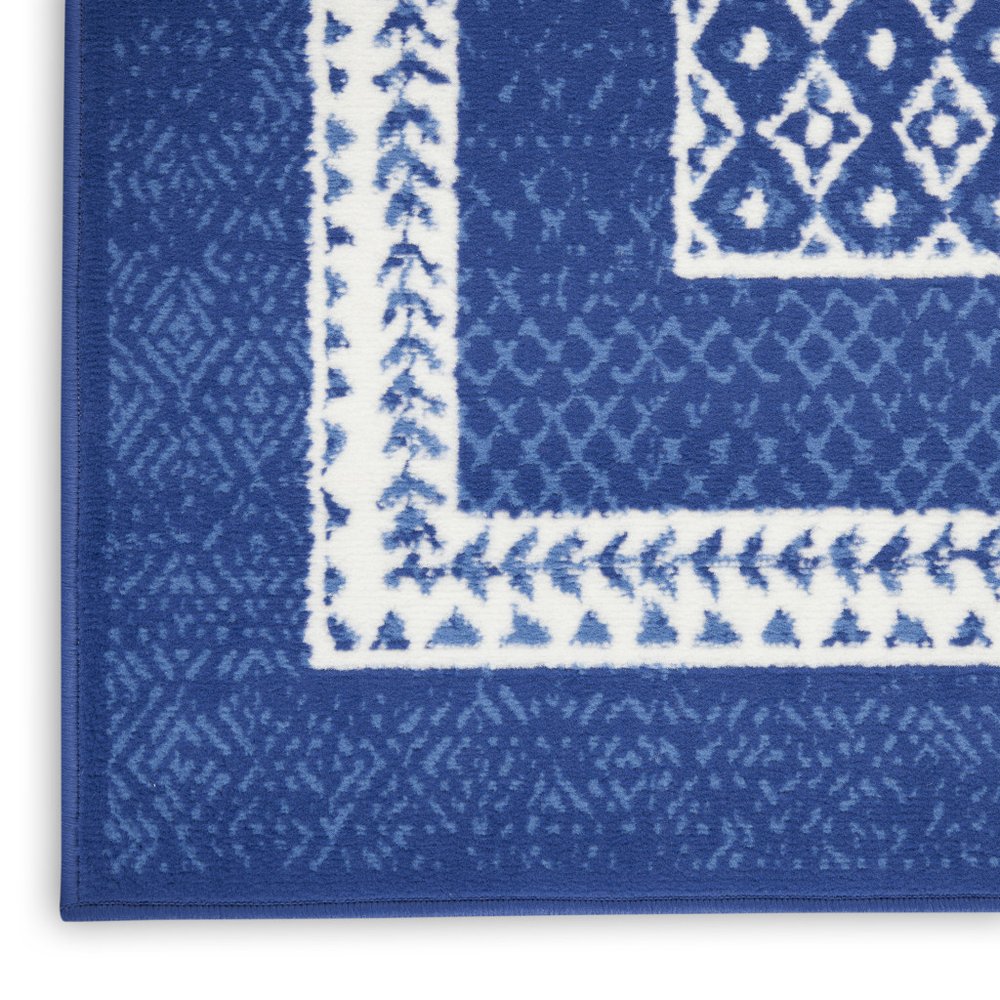 5' X 7' Ivory And Blue Ombre Distressed Area Rug