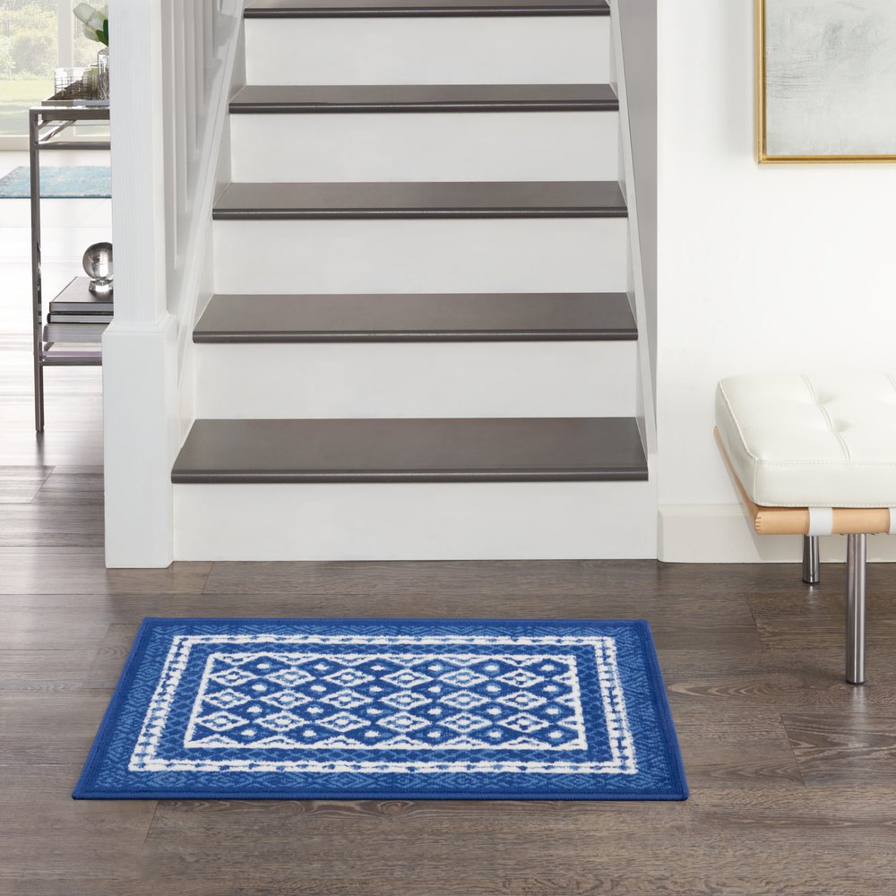 5' X 7' Ivory And Blue Ombre Distressed Area Rug