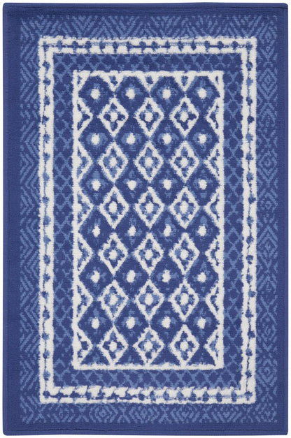 5' X 7' Ivory And Blue Ombre Distressed Area Rug