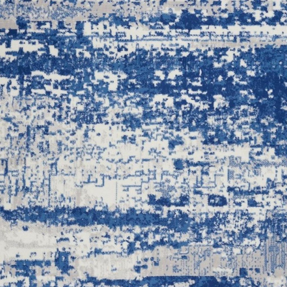 5' X 7' Ivory And Blue Ombre Distressed Area Rug