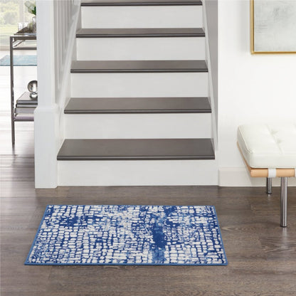 4' X 6' Blue And Ivory Abstract Dhurrie Area Rug