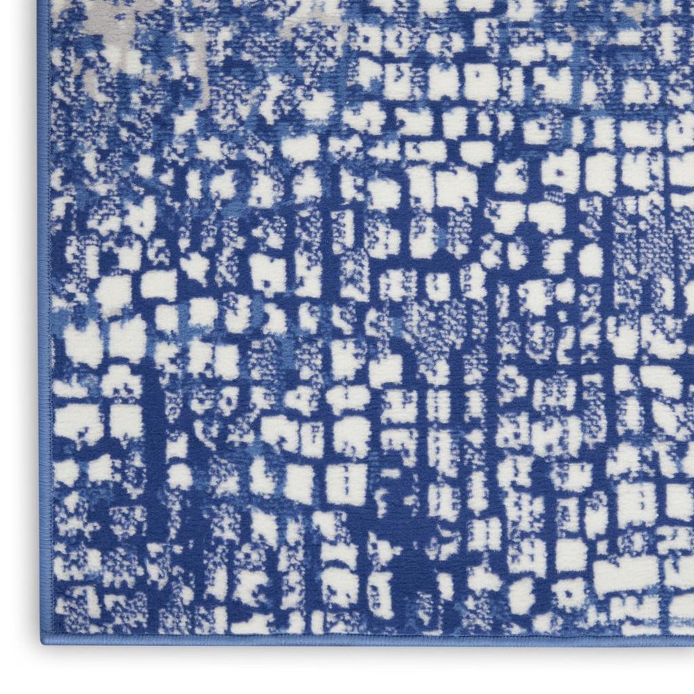 6' X 9' Ivory And Blue Geometric Area Rug