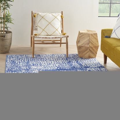 4' X 6' Ivory And Blue Geometric Area Rug