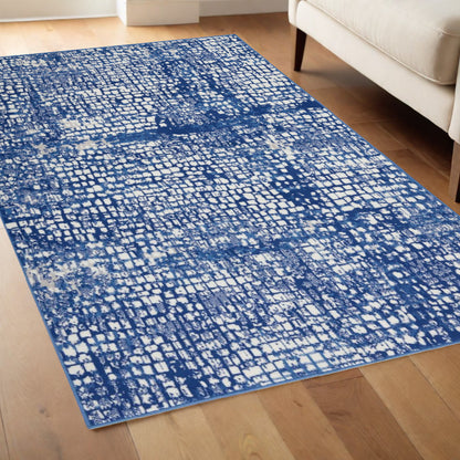 4' X 6' Blue And Ivory Abstract Dhurrie Area Rug