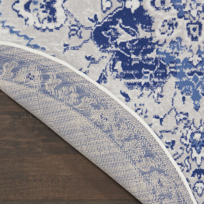 4' X 6' Ivory And Blue Geometric Area Rug