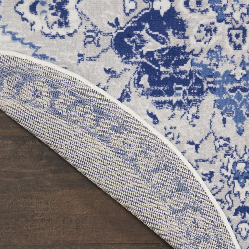 4' X 6' Ivory And Blue Geometric Area Rug
