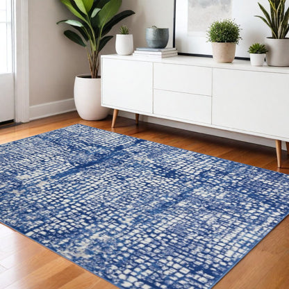6' X 9' Ivory And Blue Geometric Area Rug