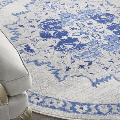4' X 6' Ivory And Blue Geometric Area Rug