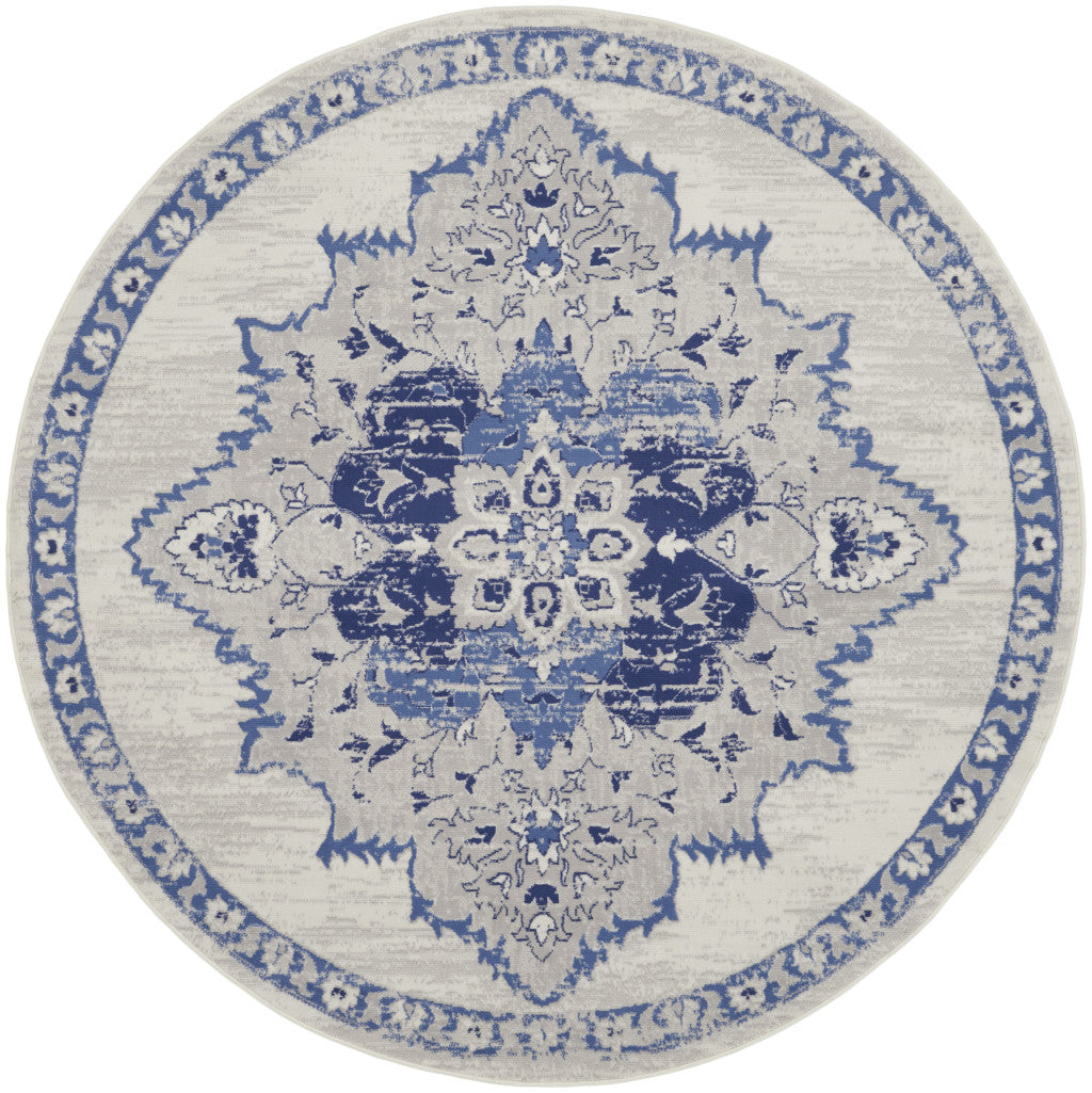 4' X 6' Ivory And Blue Geometric Area Rug