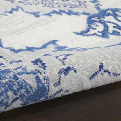 4' X 6' Ivory And Blue Geometric Area Rug