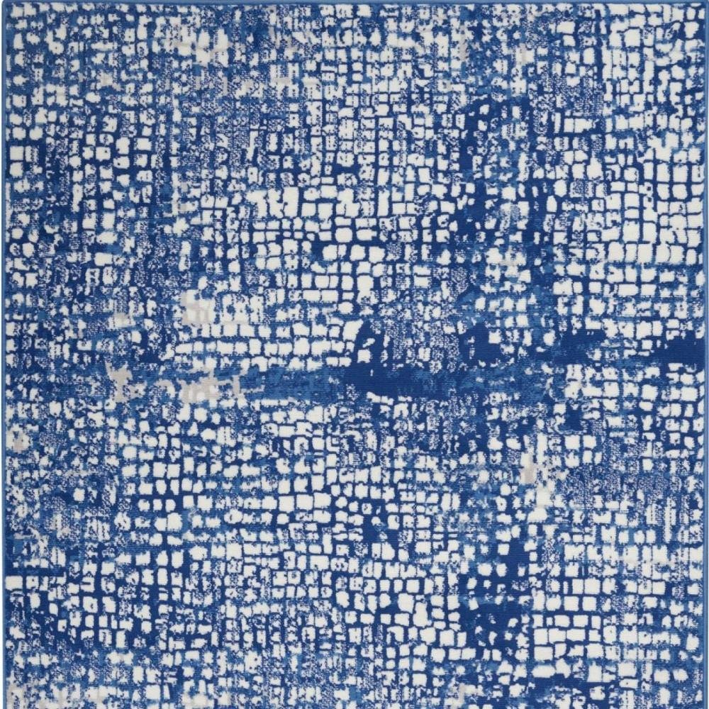 6' X 9' Ivory And Blue Geometric Area Rug
