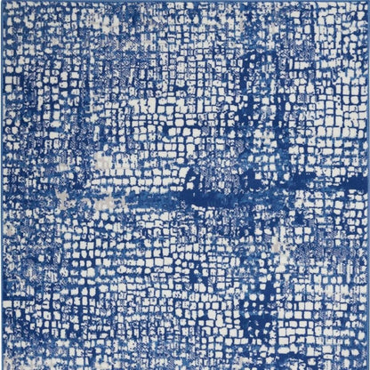 6' X 9' Ivory And Blue Geometric Area Rug