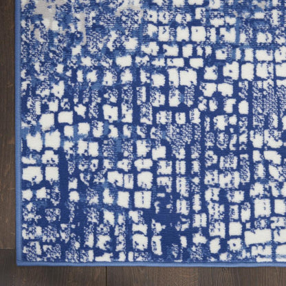 5' X 7' Ivory And Blue Geometric Area Rug