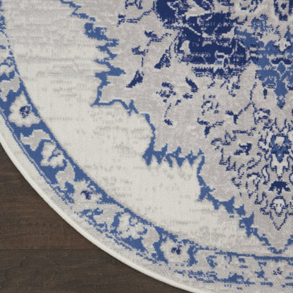 4' X 6' Ivory And Blue Geometric Area Rug