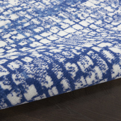 5' X 7' Ivory And Blue Geometric Area Rug