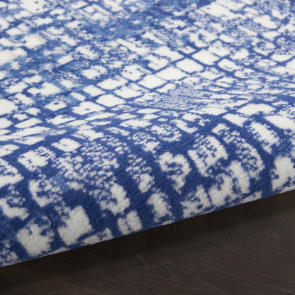 6' X 9' Ivory And Blue Geometric Area Rug