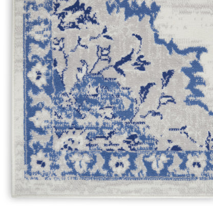 4' X 6' Ivory And Blue Geometric Area Rug