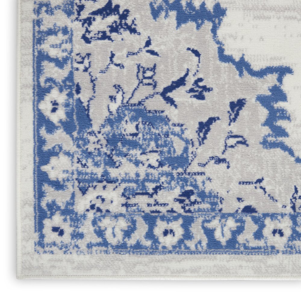 4' X 6' Ivory And Blue Geometric Area Rug