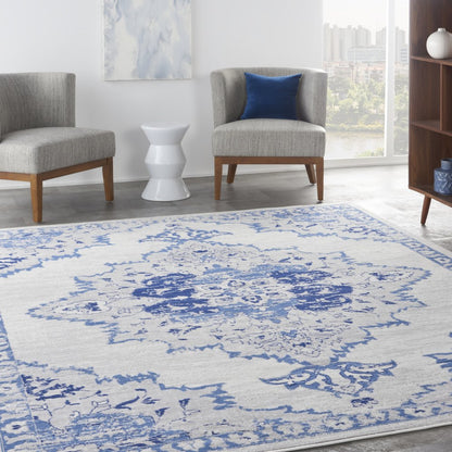 4' X 6' Ivory And Blue Geometric Area Rug