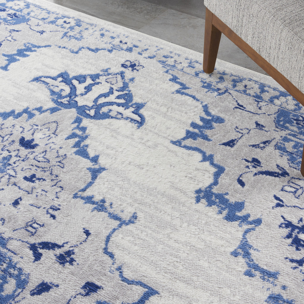 4' X 6' Ivory And Blue Geometric Area Rug